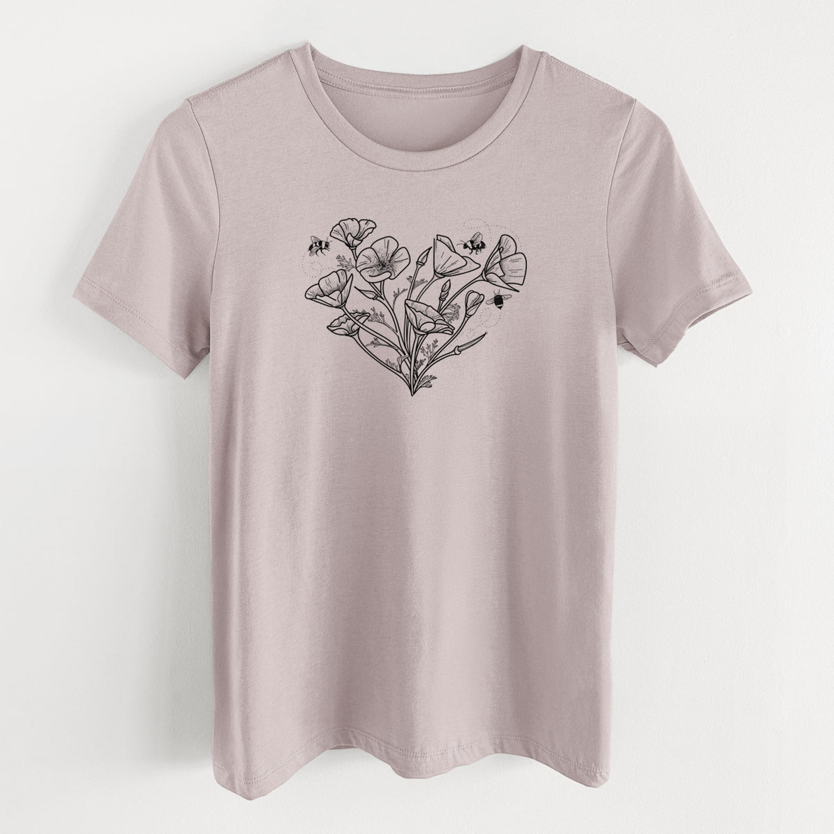 Pink gravel women's relaxed fit cotton t-shirt laid flat, printed with a black ink line drawing of California poppies arranged in a heart shape, with small bees.
