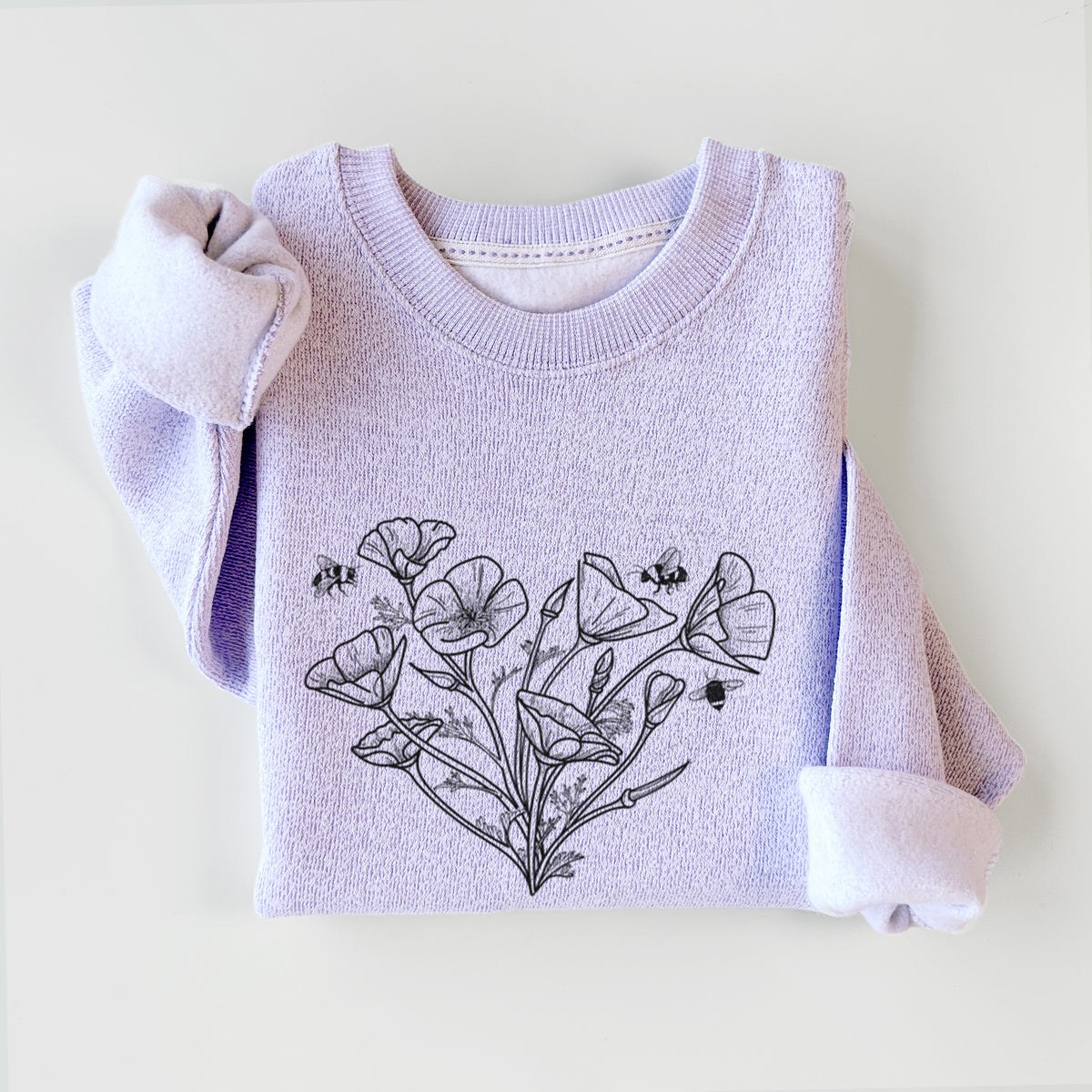 Ice purple knit sweatshirt printed with a black ink line drawing of California poppies arranged in a heart shape, with small bees, styled flat.