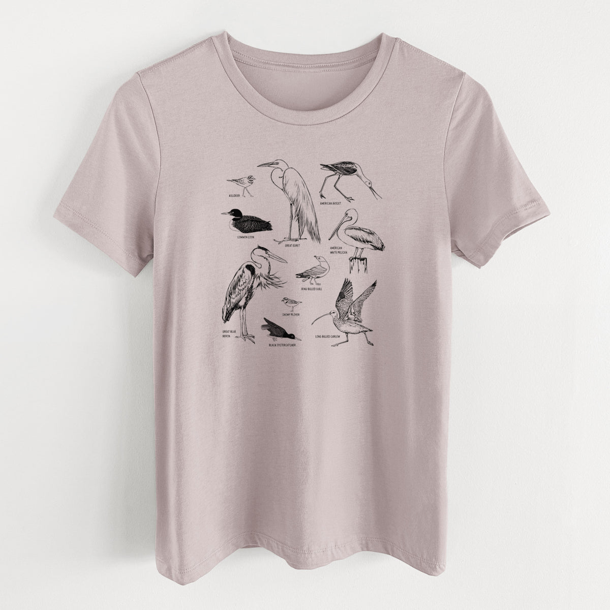 Pink gravel women's relaxed fit cotton t-shirt laid flat, printed with a chart of black ink California shorebirds, including herons, egrets, avocets and sandpipers.