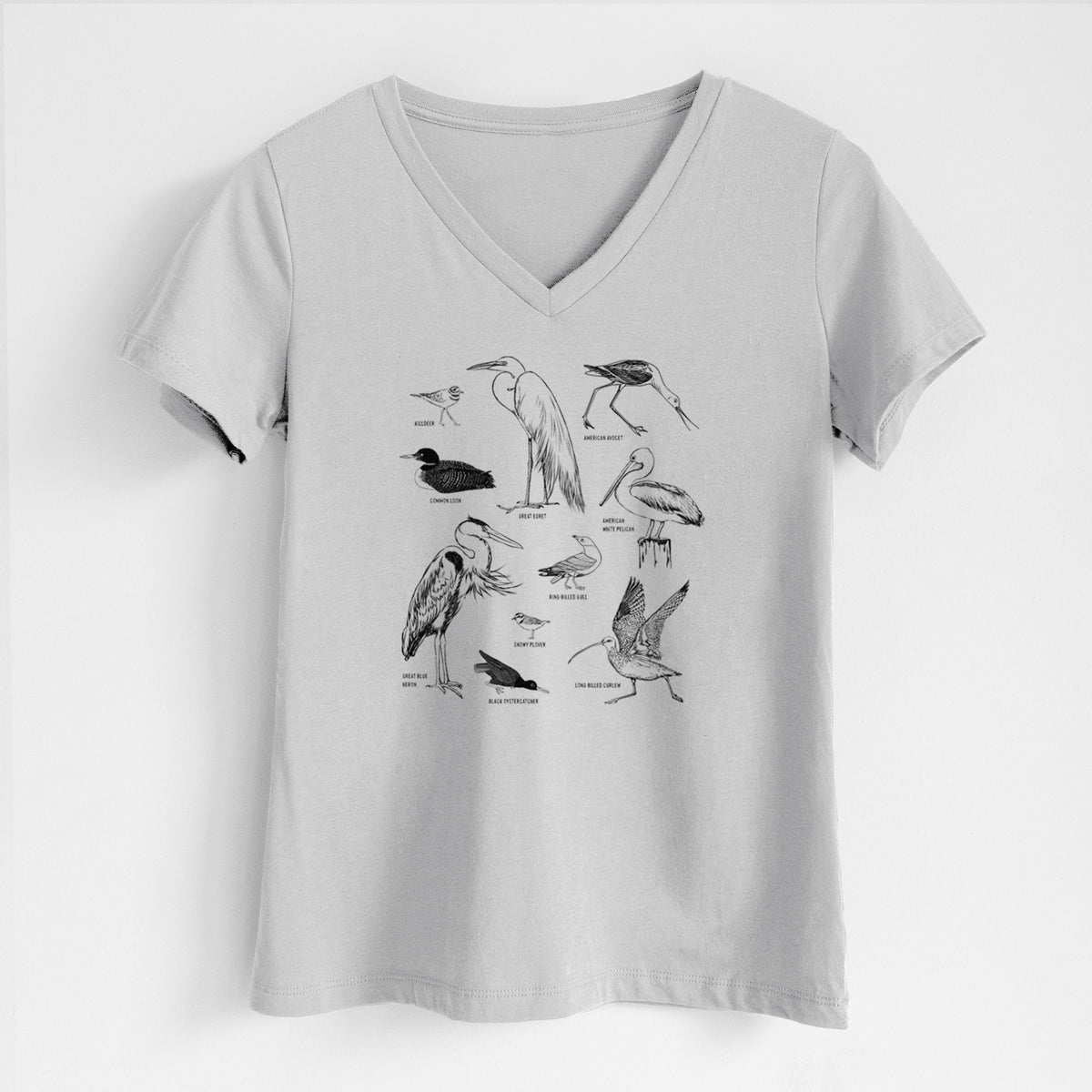 Lunar grey women's relaxed fit cotton V-neck t-shirt laid flat, printed with a chart of black ink California shorebirds, including herons, egrets, avocets and sandpipers.