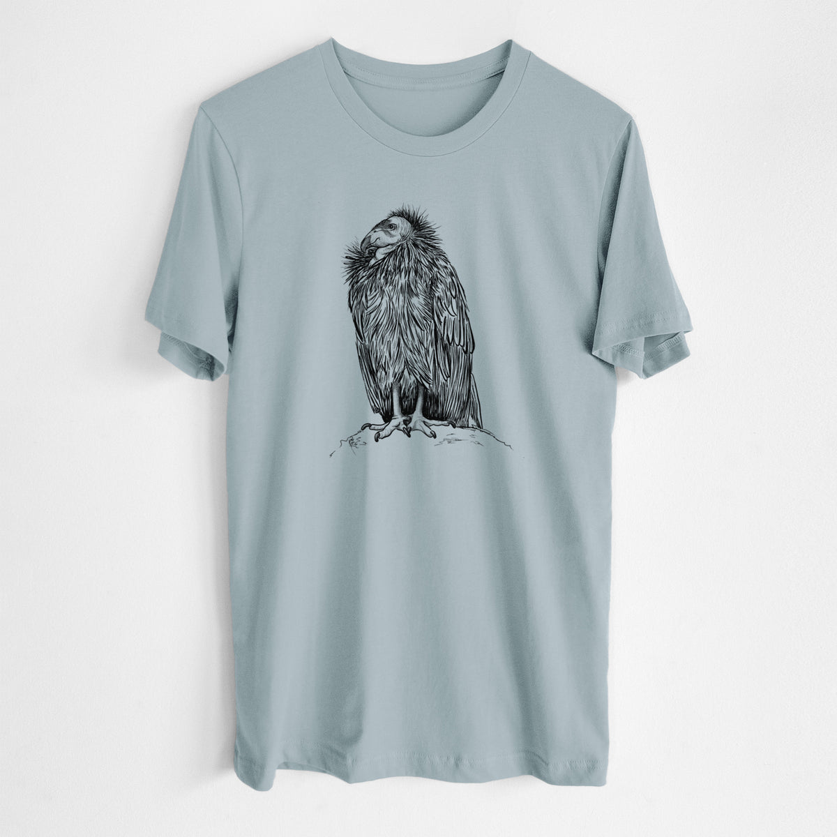 Vintage denim lightweight cotton t-shirt laid flat, printed with a detailed black ink illustration of a California condor perched with folded wings.