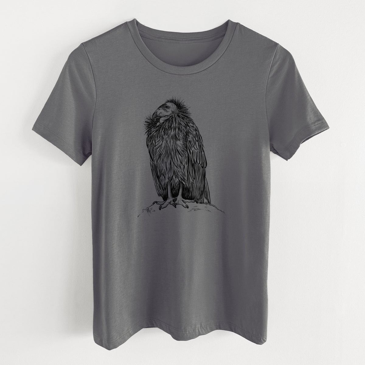 Asphalt women's relaxed fit cotton t-shirt laid flat, printed with a detailed black ink illustration of a California condor perched with folded wings.
