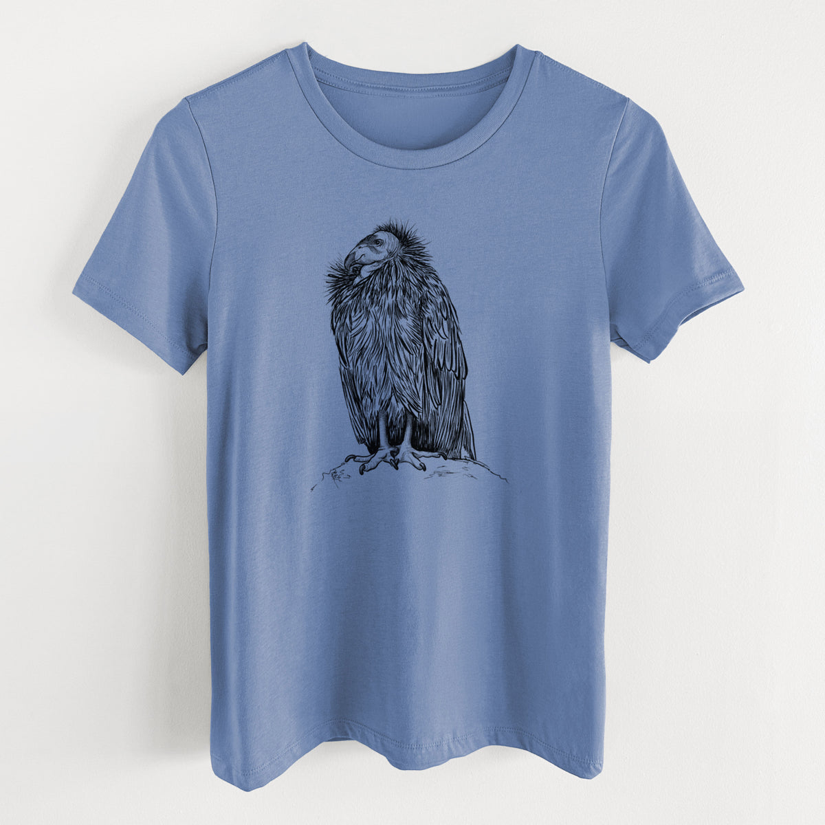Blue bell women's relaxed fit cotton t-shirt laid flat, printed with a detailed black ink illustration of a California condor perched with folded wings.