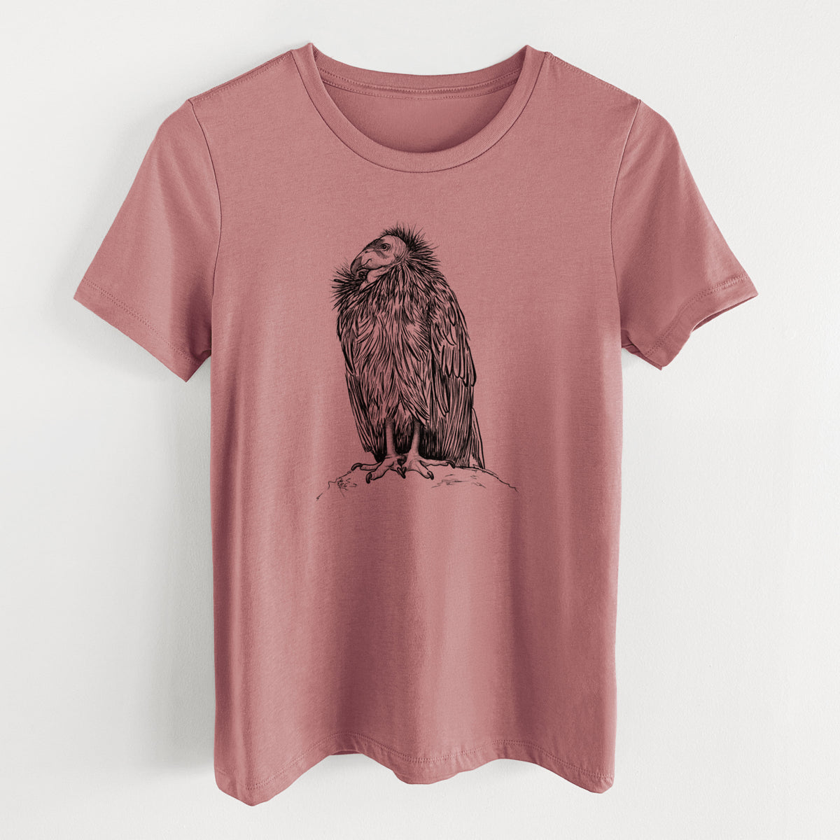 Mauve pink women's relaxed fit cotton t-shirt laid flat, printed with a detailed black ink illustration of a California condor perched with folded wings.
