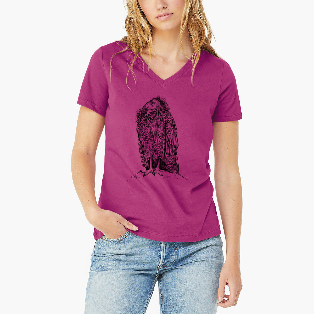 Woman wearing a berry pink women's relaxed fit cotton V-neck t-shirt printed with a detailed black ink illustration of a California condor perched with folded wings.