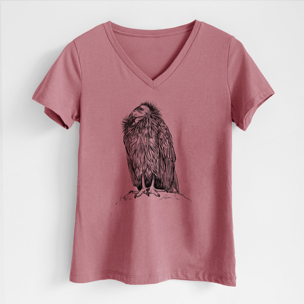 Mauve pink women's relaxed fit cotton V-neck t-shirt laid flat, printed with a detailed black ink illustration of a California condor perched with folded wings.