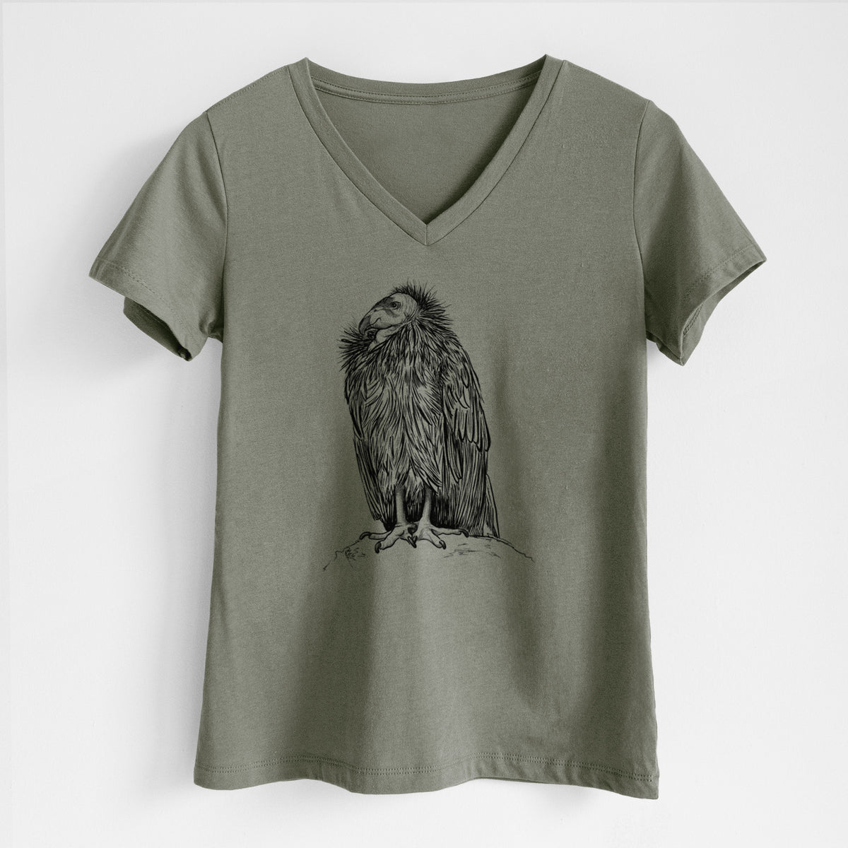 Military green women's relaxed fit cotton V-neck t-shirt laid flat, printed with a detailed black ink illustration of a California condor perched with folded wings.