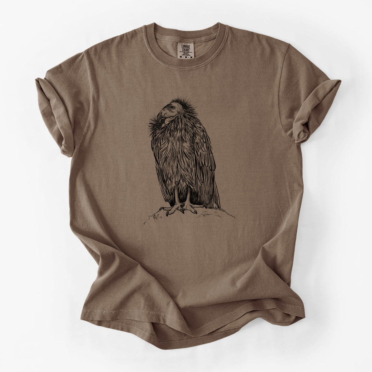 Espresso brown Comfort Colors t-shirt laid flat, printed with a detailed black ink illustration of a California condor perched with folded wings.