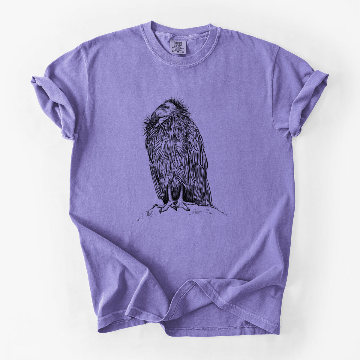 Violet purple Comfort Colors t-shirt laid flat, printed with a detailed black ink illustration of a California condor perched with folded wings.