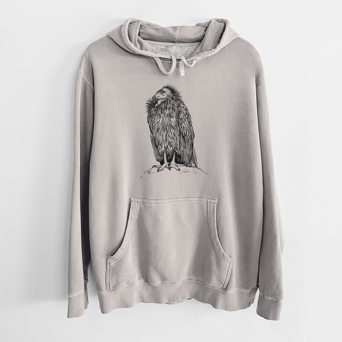 Cement grey pigment dyed hoodie laid flat, printed with a detailed black ink illustration of a California condor perched with folded wings.