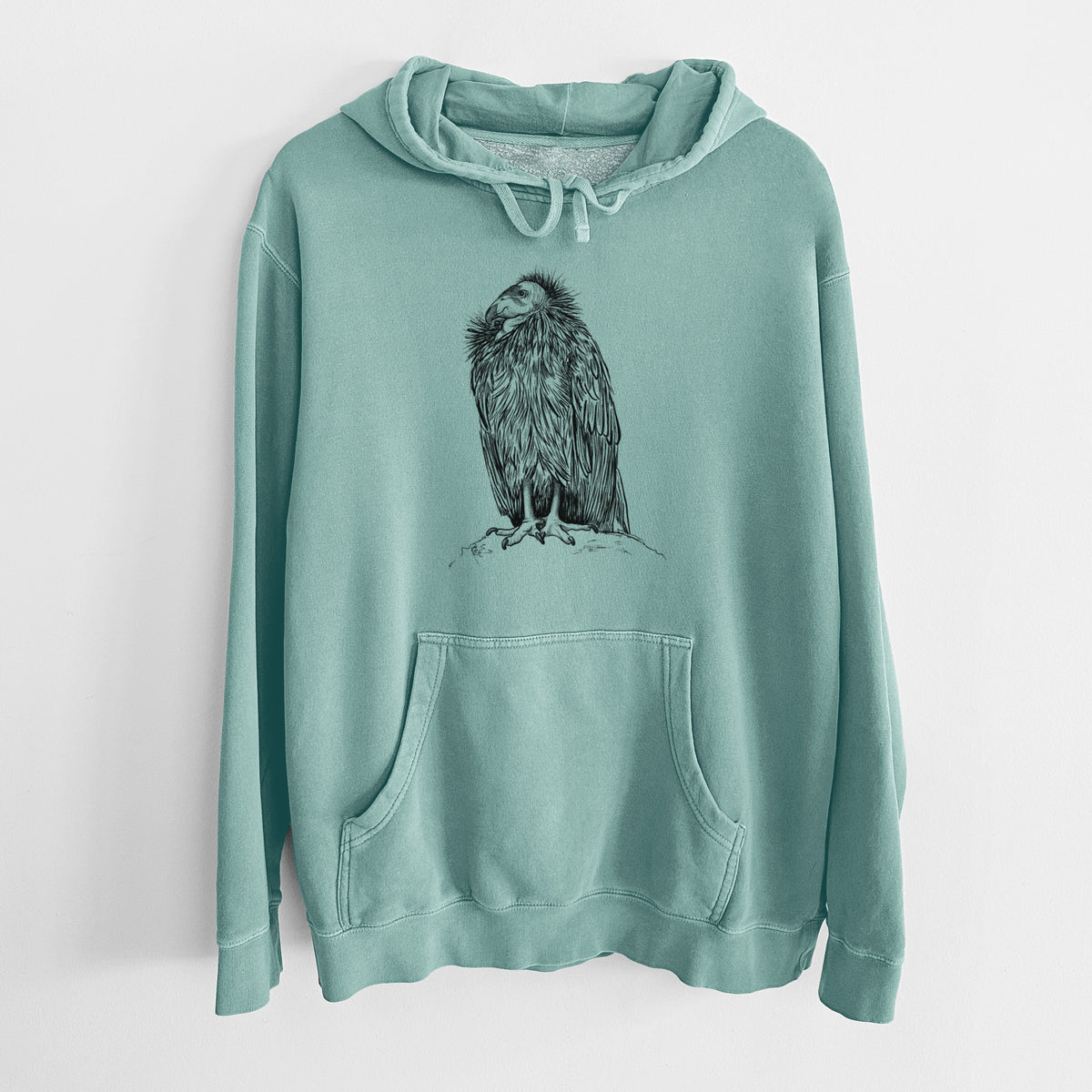 Mint green pigment dyed hoodie laid flat, printed with a detailed black ink illustration of a California condor perched with folded wings.