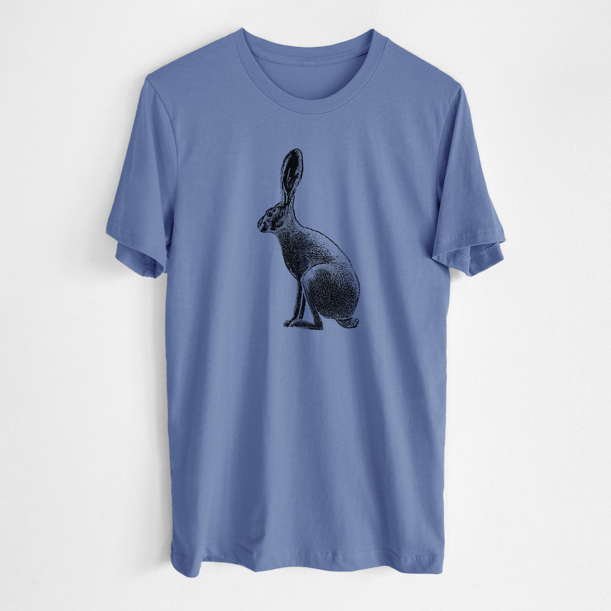 Blue bell lightweight cotton t-shirt laid flat, printed with a detailed black ink illustration of a black-tailed jackrabbit sitting in profile with tall ears.