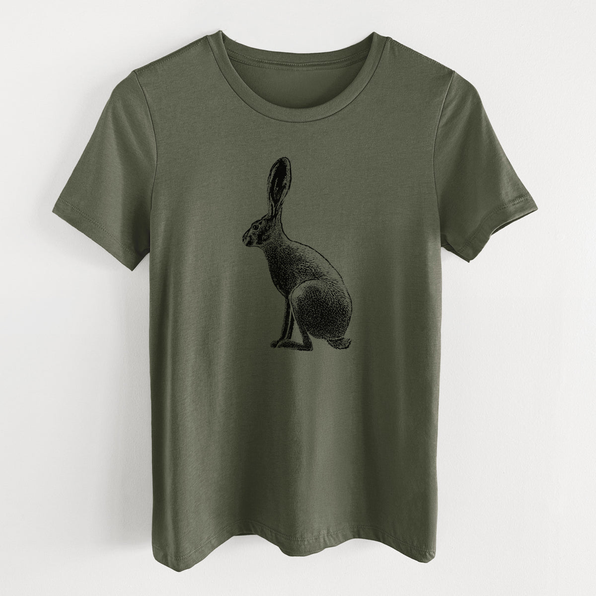 Military green women's relaxed fit cotton t-shirt laid flat, printed with a detailed black ink illustration of a black-tailed jackrabbit sitting in profile with tall ears.