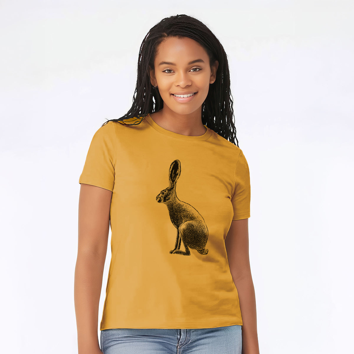 Woman wearing a mustard yellow women's relaxed fit cotton t-shirt printed with a detailed black ink illustration of a black-tailed jackrabbit sitting in profile with tall ears.