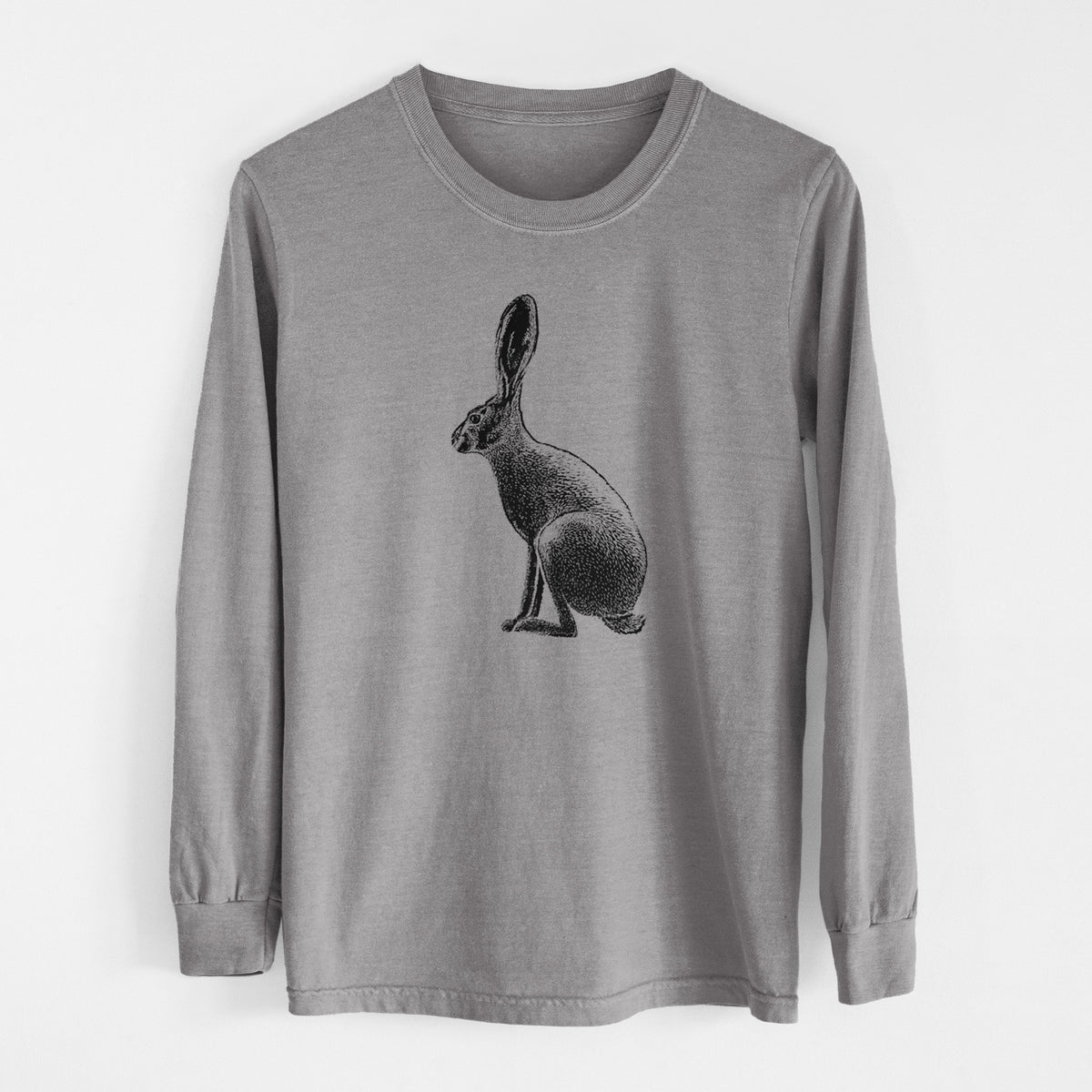 Grey Comfort Colors long sleeve shirt laid flat, printed with a detailed black ink illustration of a black-tailed jackrabbit sitting in profile with tall ears.