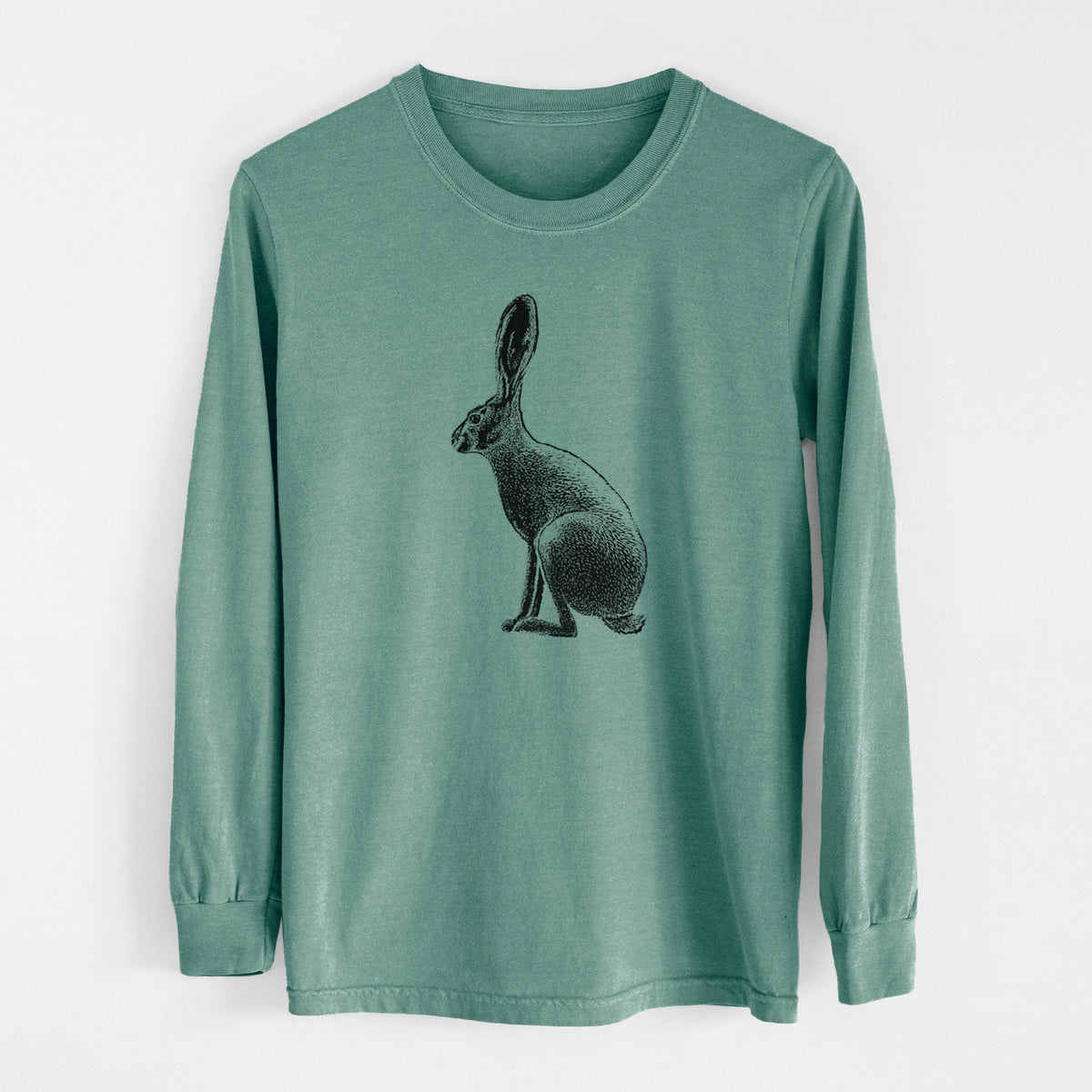 Pine green Comfort Colors long sleeve shirt laid flat, printed with a detailed black ink illustration of a black-tailed jackrabbit sitting in profile with tall ears.