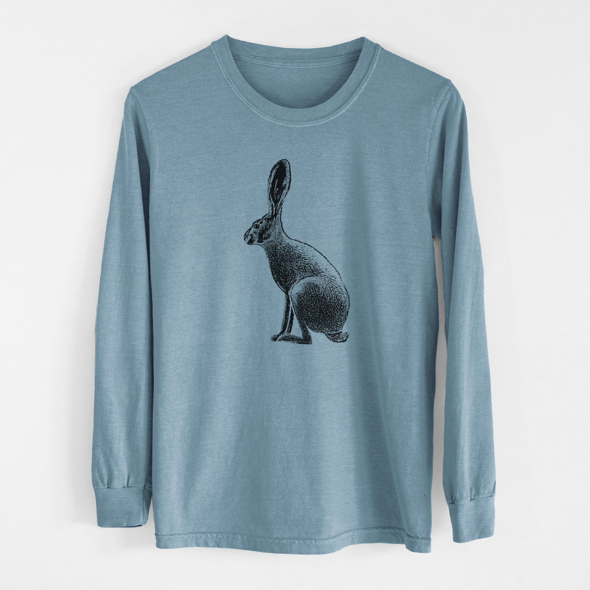 Steel blue Comfort Colors long sleeve shirt laid flat, printed with a detailed black ink illustration of a black-tailed jackrabbit sitting in profile with tall ears.
