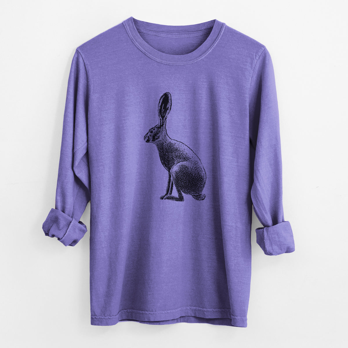 Violet purple Comfort Colors long sleeve shirt laid flat with the cuffs rolled, printed with a detailed black ink illustration of a black-tailed jackrabbit sitting in profile with tall ears.