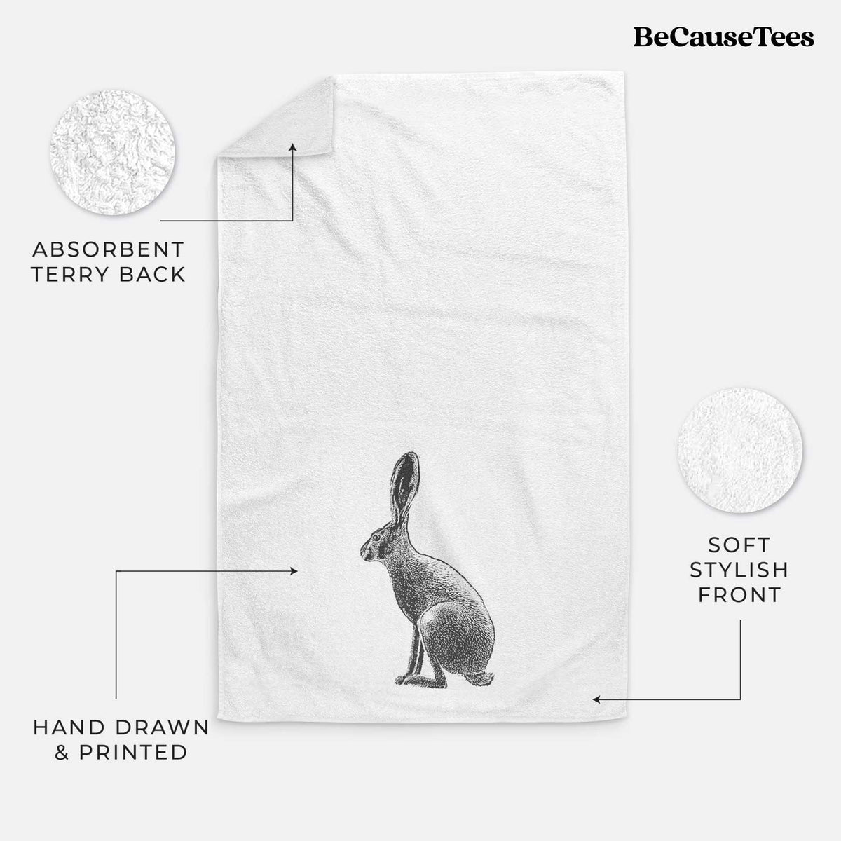 White hand towel printed with a detailed black ink illustration of a black-tailed jackrabbit sitting in profile with tall ears.