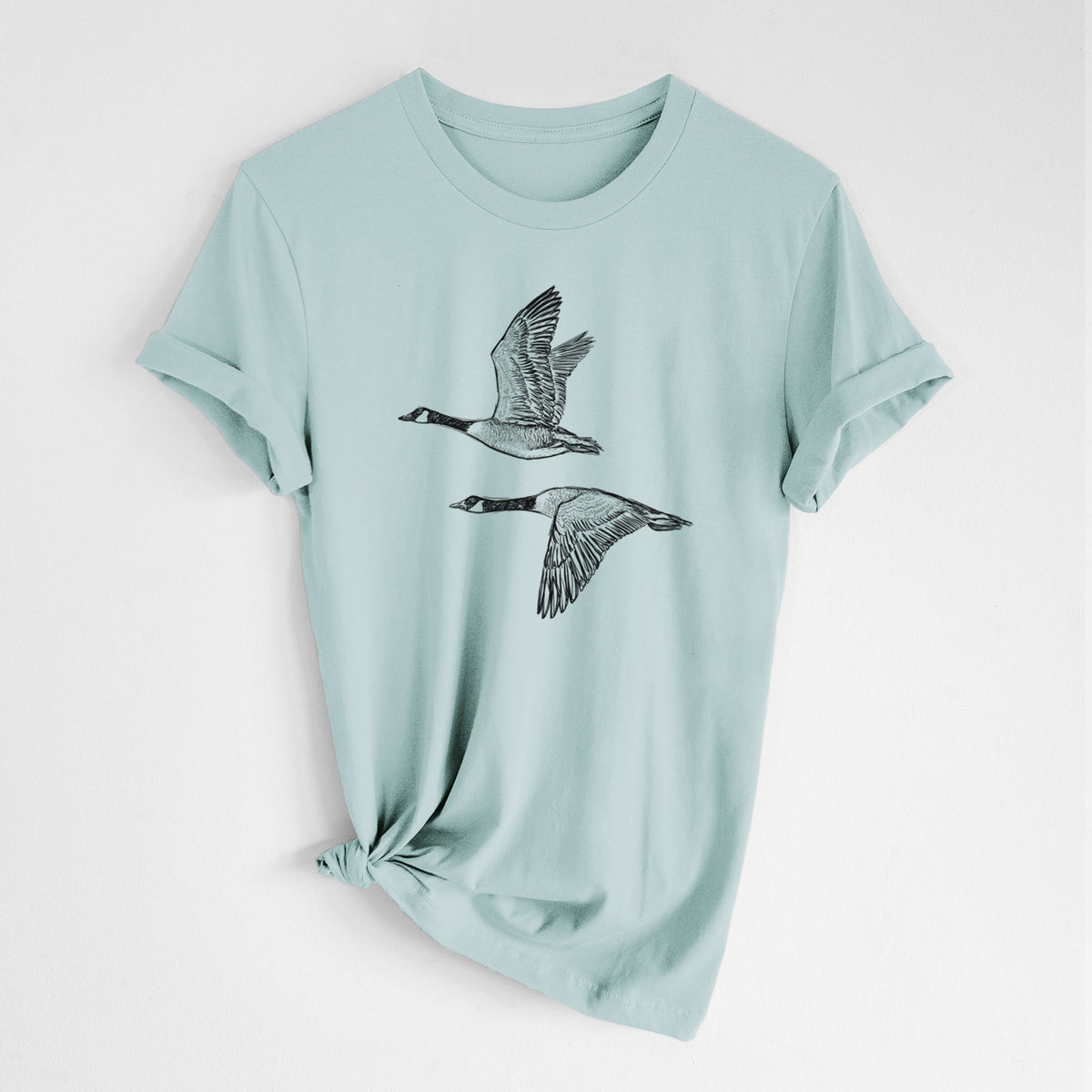 Canada Geese in Flight - Branta canadensis - Lightweight 100% Cotton Unisex Crewneck in Dusty Blue, worn by model