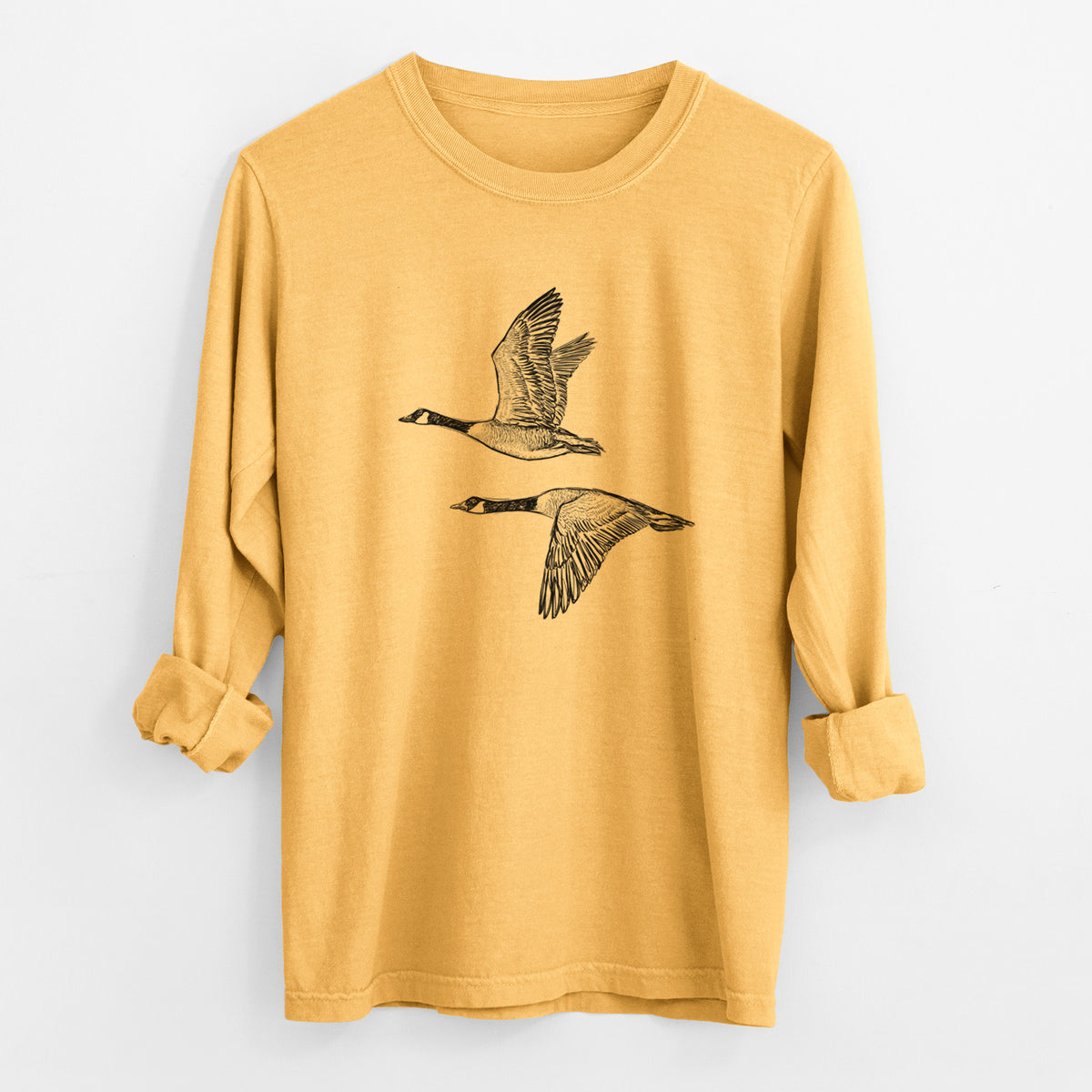 Canada Geese in Flight - Branta canadensis - Unisex Comfort Colors 100% Cotton Long Sleeve in Golden Wheat, worn by model