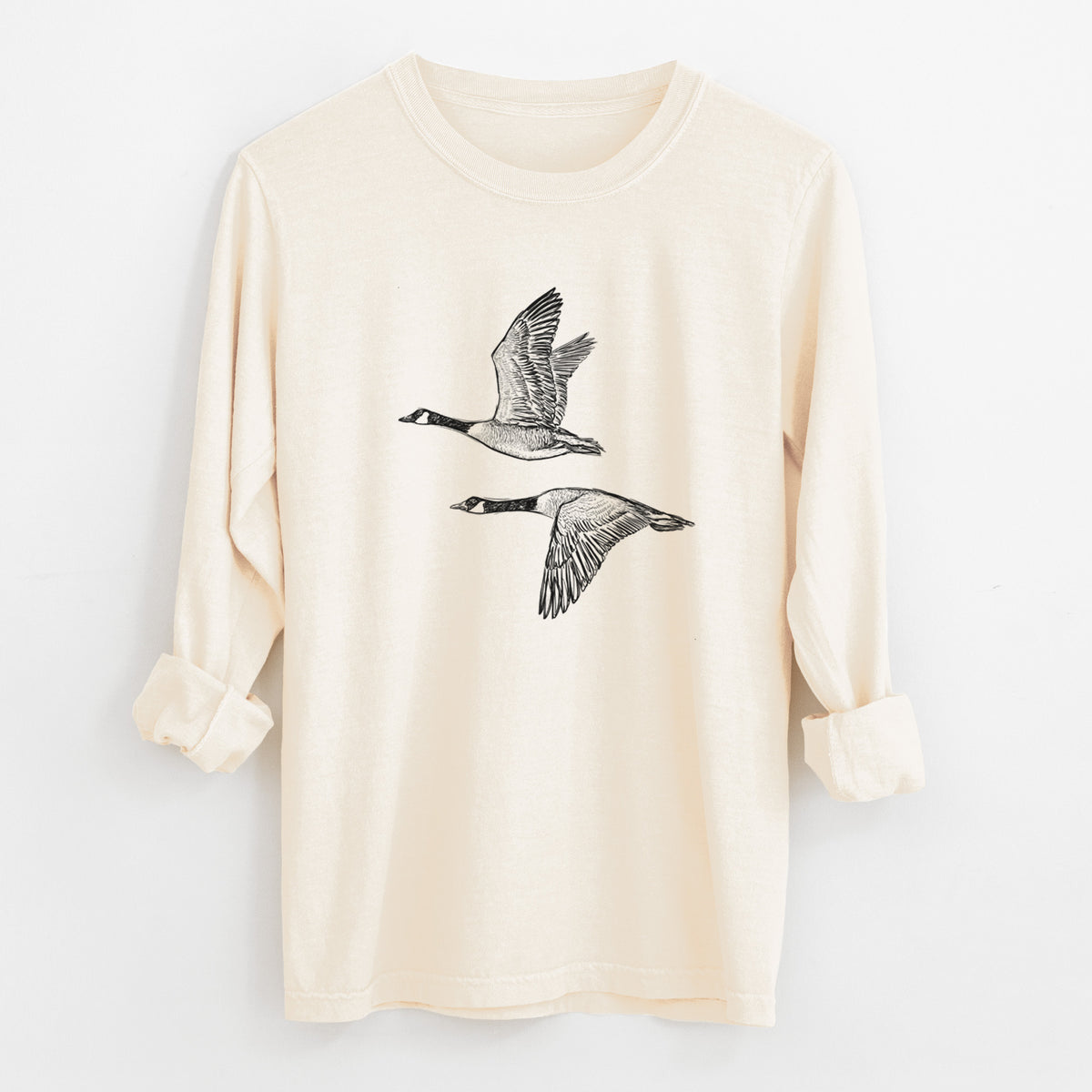 Canada Geese in Flight - Branta canadensis - Unisex Comfort Colors 100% Cotton Long Sleeve in Ivory, worn by model