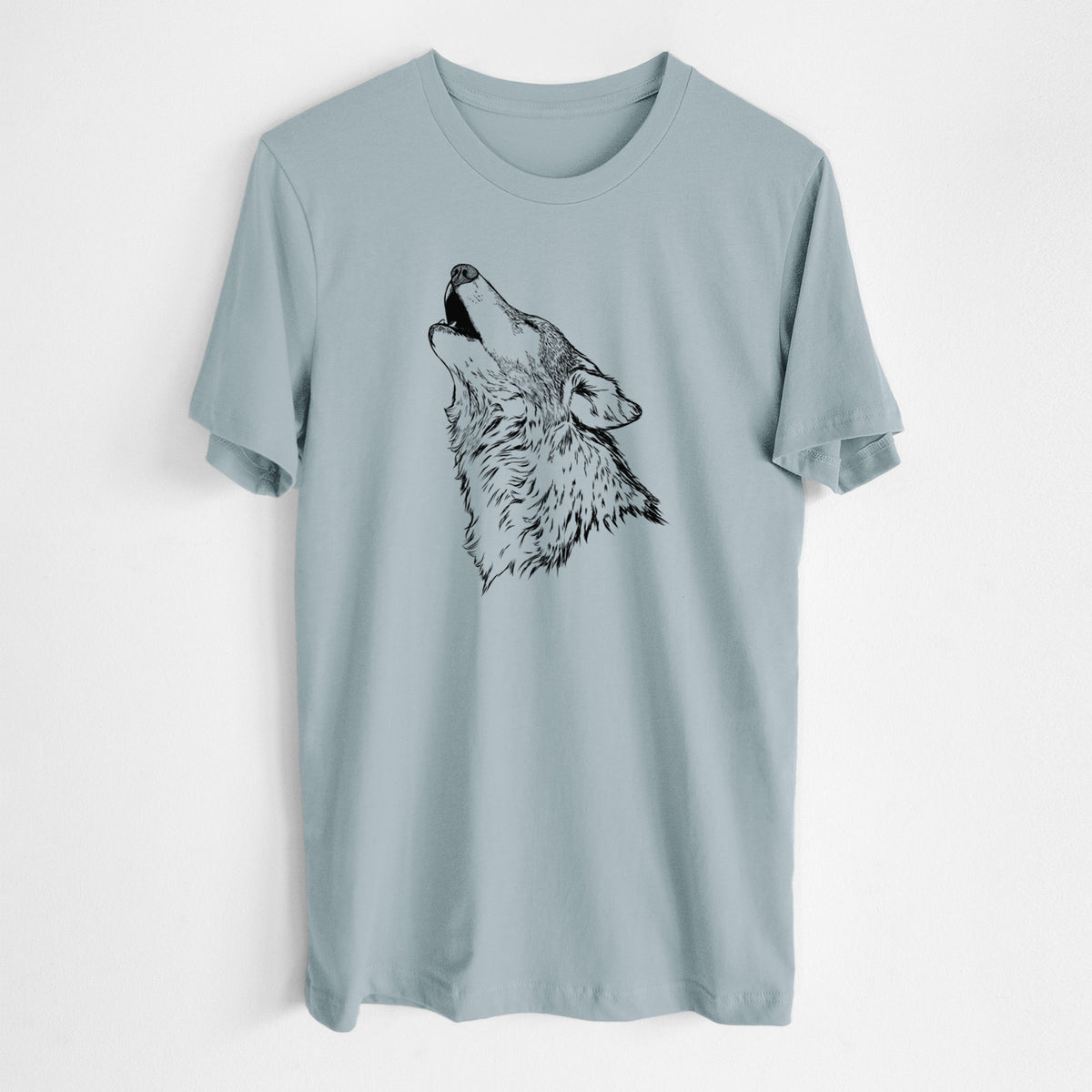 Vintage denim lightweight cotton t-shirt laid flat, printed with a detailed black ink illustration of a grey wolf's head and shoulders, howling upward.