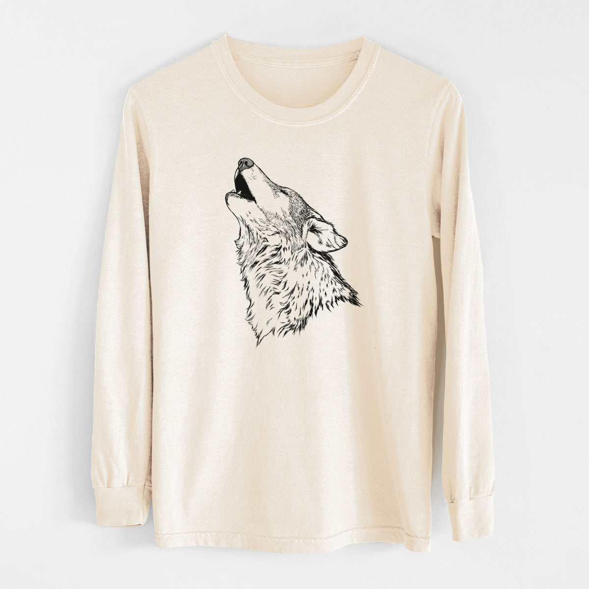 Ivory Comfort Colors long sleeve shirt laid flat, printed with a detailed black ink illustration of a grey wolf's head and shoulders, howling upward.