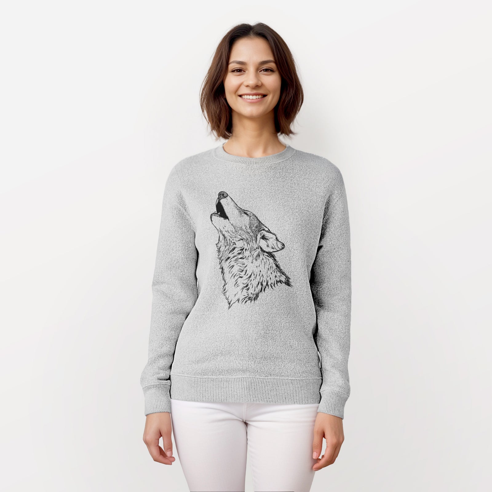 Salt and pepper knit sweatshirt laid flat, printed with a detailed black ink illustration of a grey wolf's head and shoulders, howling upward.