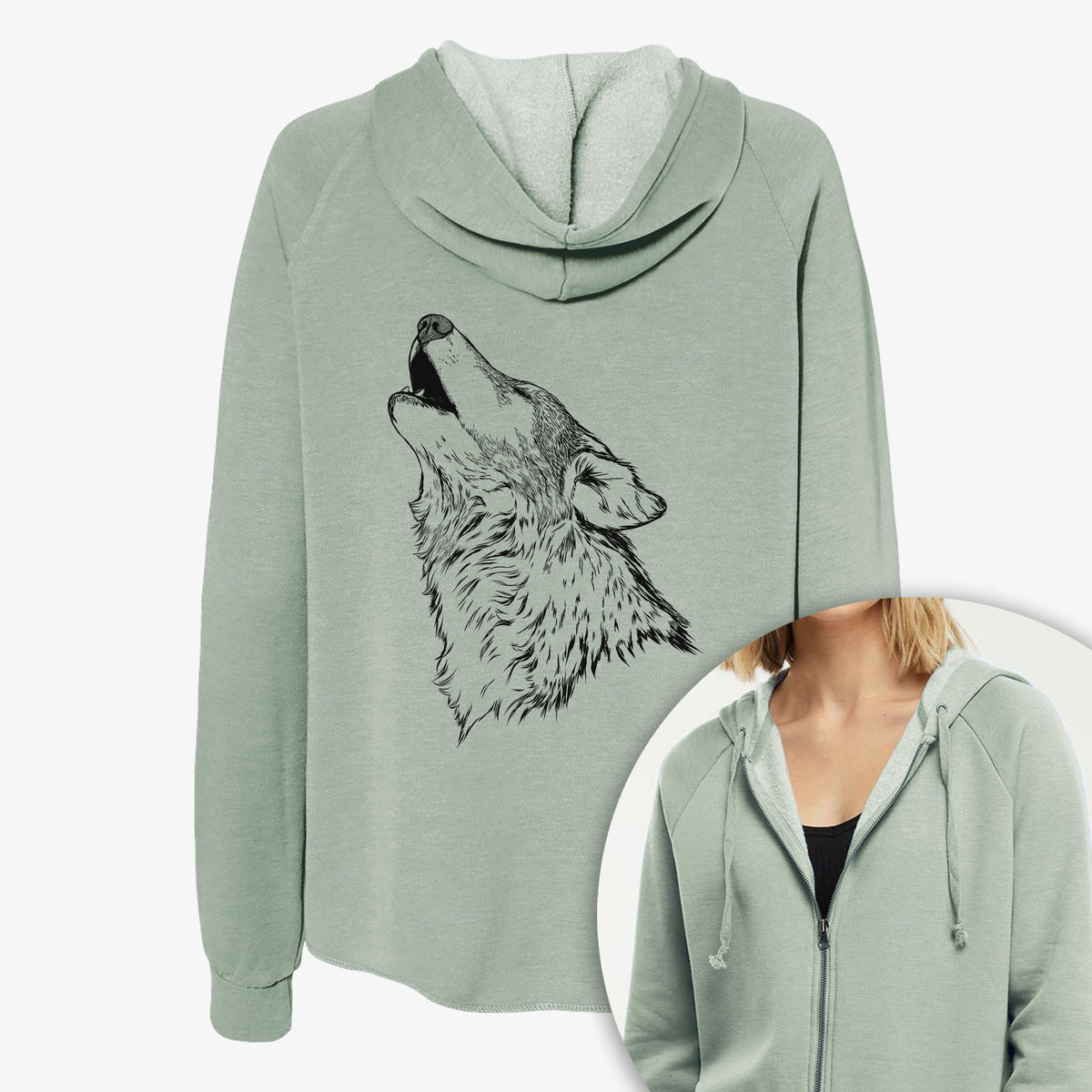 Women's Cali Wave zip-up sweatshirt printed with a detailed black ink illustration of a grey wolf's head and shoulders, howling upward, with a close-up of the zipper.