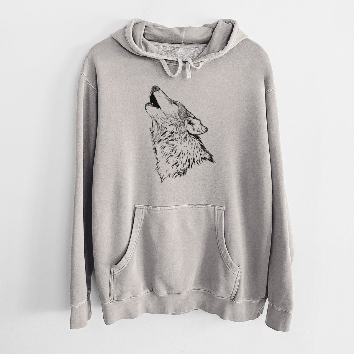 Cement grey pigment dyed hoodie laid flat, printed with a detailed black ink illustration of a grey wolf's head and shoulders, howling upward.