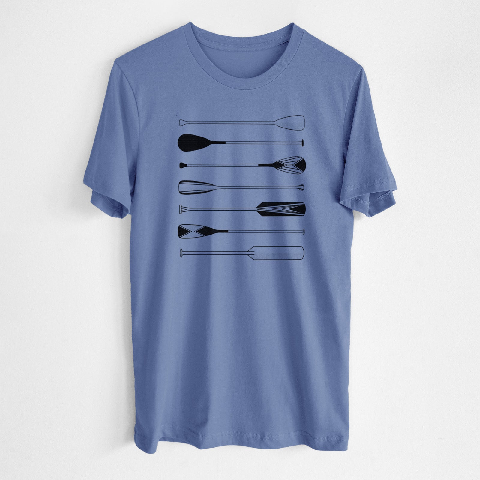 Blue bell lightweight cotton t-shirt laid flat, printed with a black ink illustration of a row of canoe and kayak paddles.