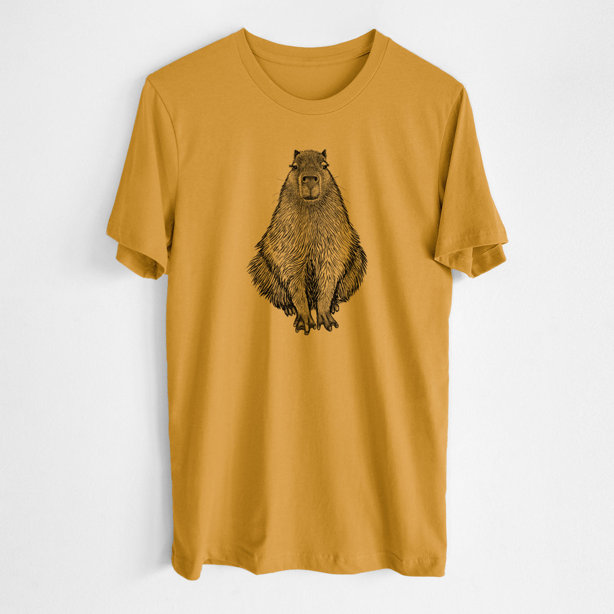 Honeycomb yellow lightweight cotton t-shirt laid flat, printed with a detailed black ink illustration of a capybara sitting and facing forward.