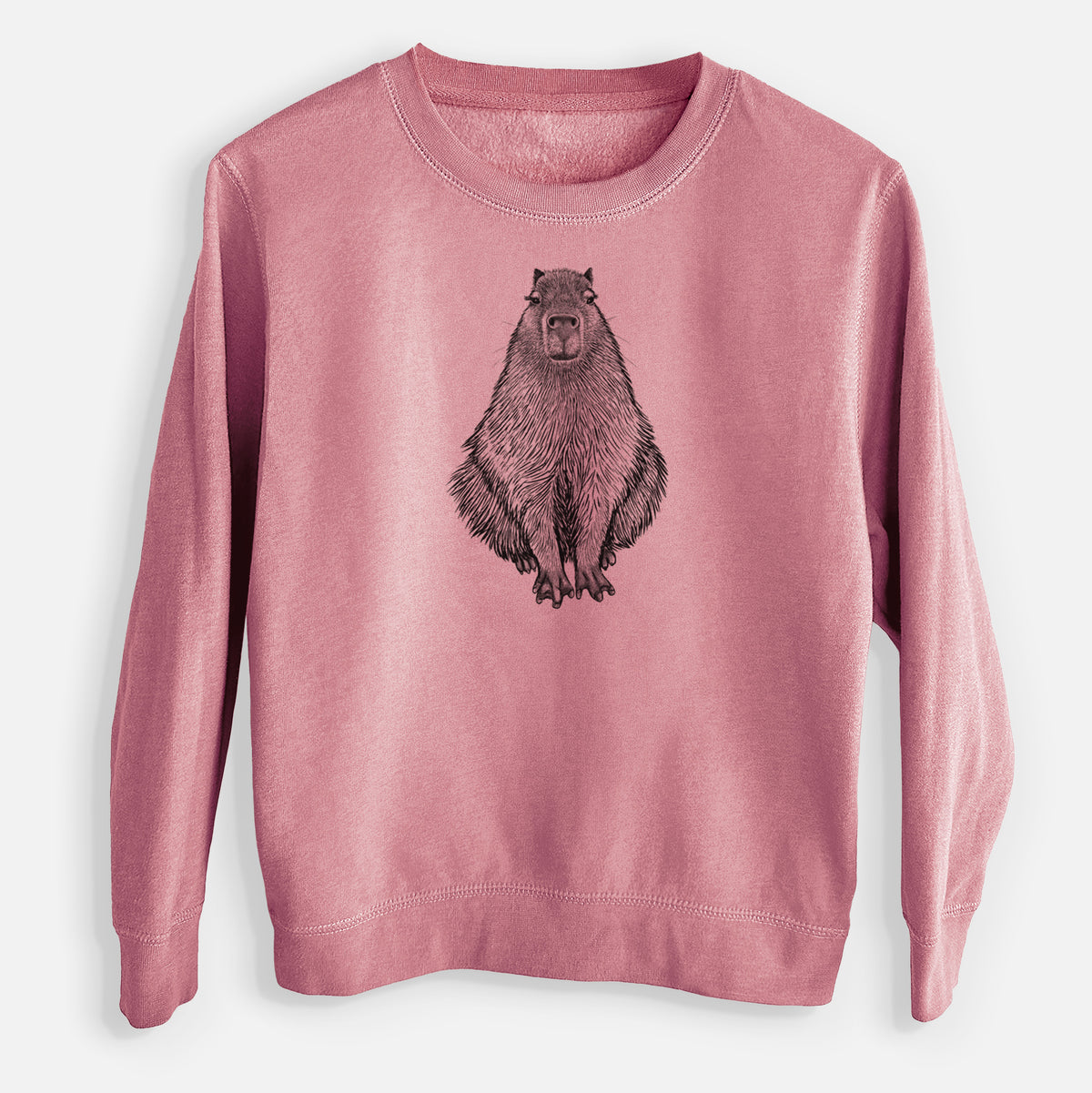 Mauve pink youth crewneck sweatshirt laid flat, printed with a detailed black ink illustration of a capybara sitting and facing forward.