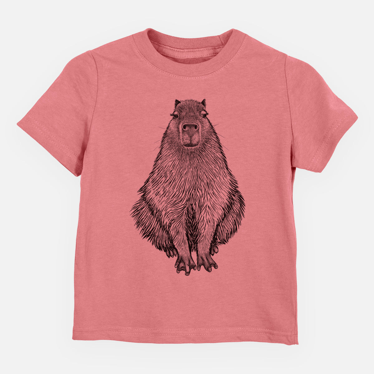Mauve pink toddler t-shirt laid flat, printed with a detailed black ink illustration of a capybara sitting and facing forward.