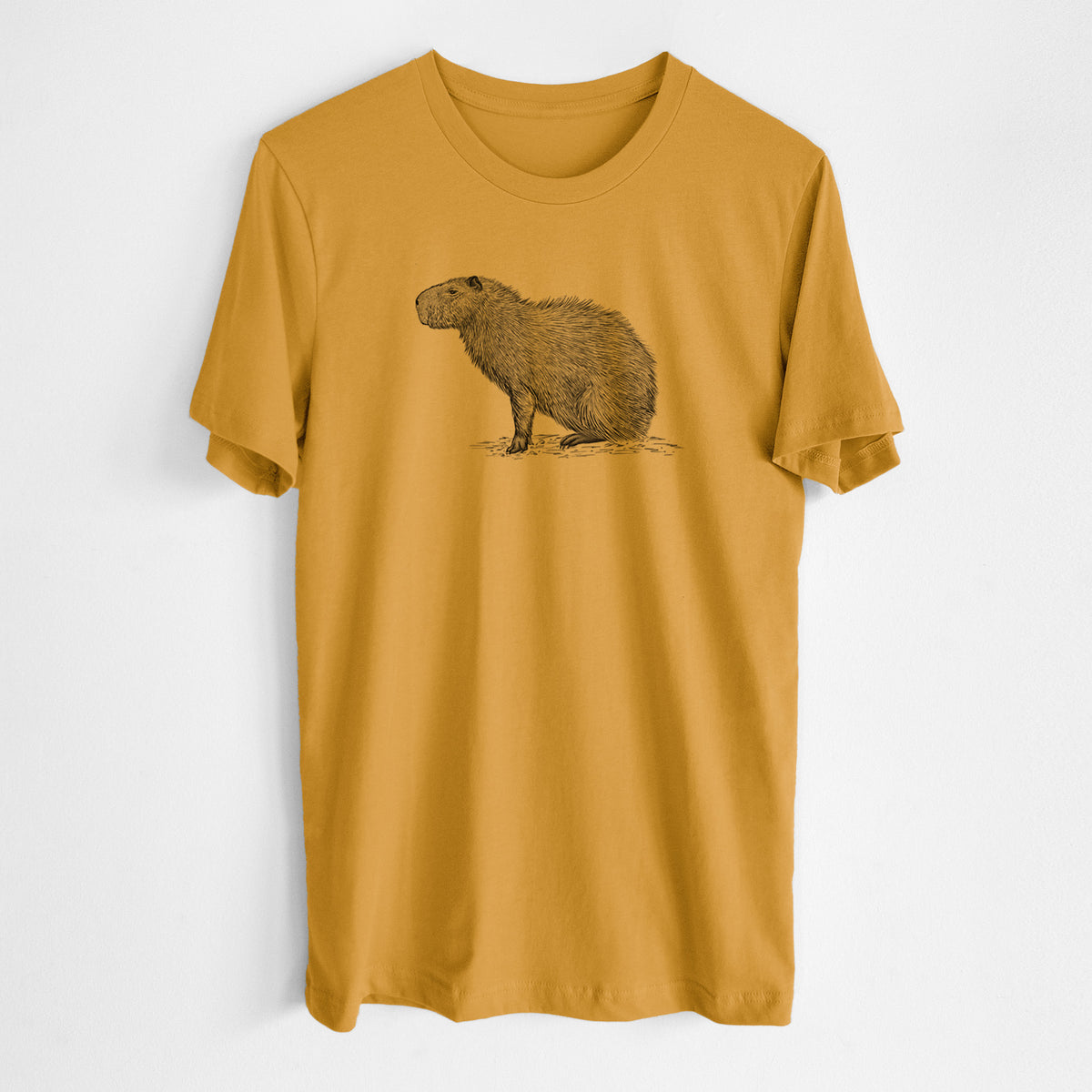 Honeycomb yellow lightweight cotton t-shirt laid flat, printed with a detailed black ink illustration of a capybara standing in profile.