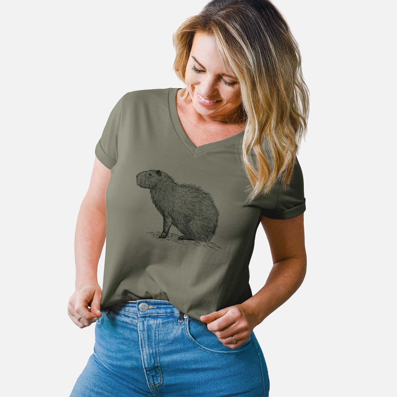 Turquoise women's relaxed fit cotton V-neck t-shirt laid flat, printed with a detailed black ink illustration of a capybara standing in profile.