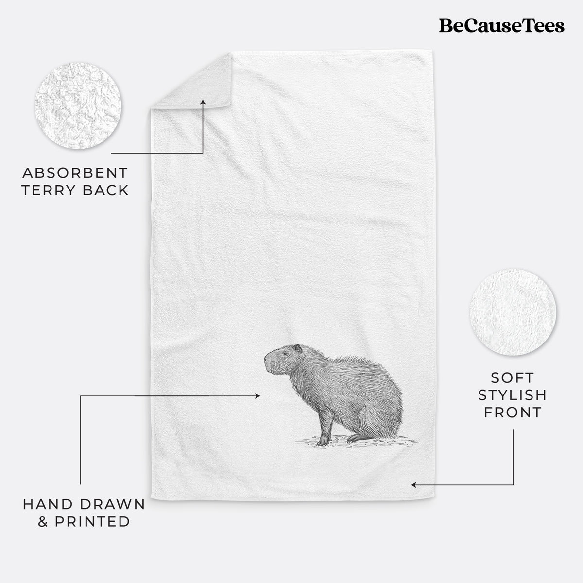 White hand towel printed with a detailed black ink illustration of a capybara standing in profile.