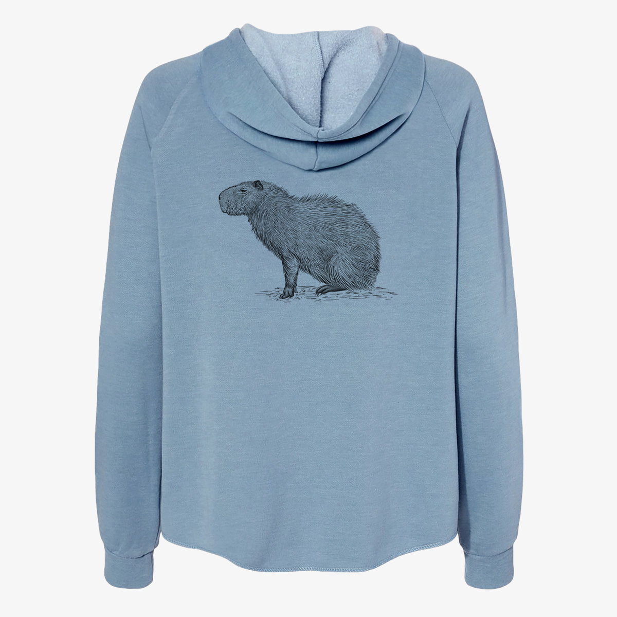 Misty blue women's Cali Wave zip-up sweatshirt laid flat, printed with a detailed black ink illustration of a capybara standing in profile.