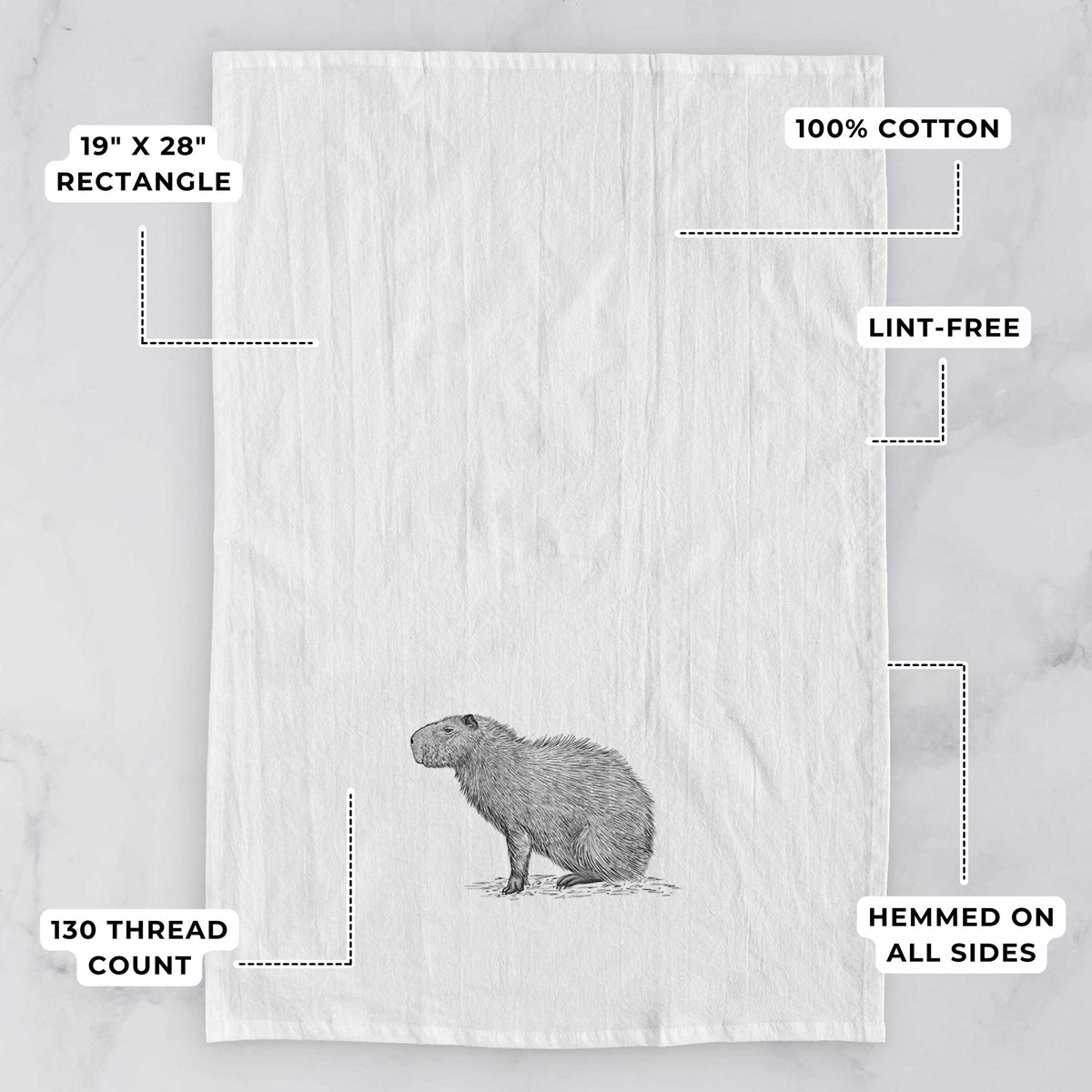 White tea towel printed with a detailed black ink illustration of a capybara standing in profile, with feature labels: 19 by 28 inch rectangle, 100% cotton, lint-free, 130 thread count, hemmed on all sides.