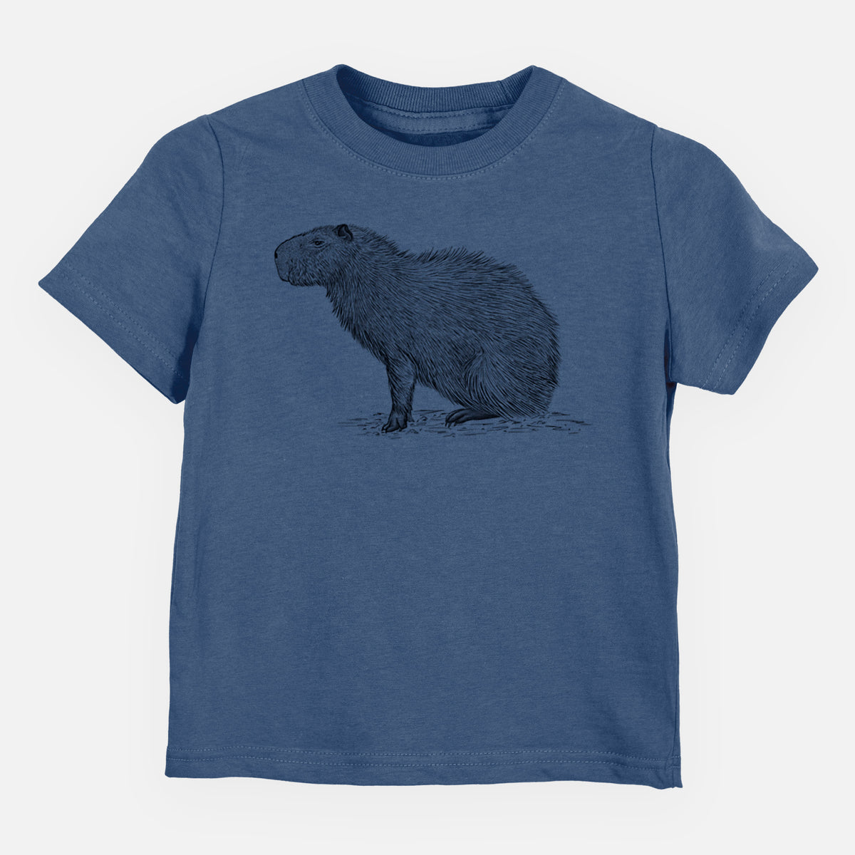 Indigo blue toddler t-shirt laid flat, printed with a detailed black ink illustration of a capybara standing in profile.