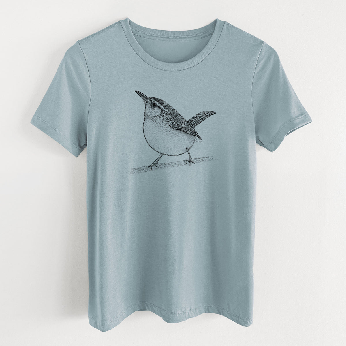 Vintage denim women's relaxed fit cotton t-shirt laid flat, printed with a detailed black ink sketch of a Carolina wren perched on a branch with its tail raised.