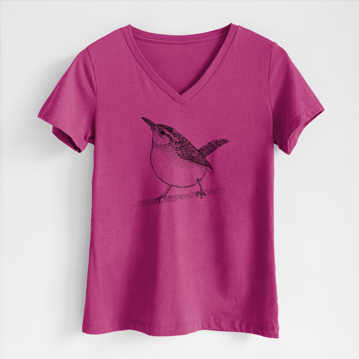 Berry pink women's relaxed fit cotton V-neck t-shirt laid flat, printed with a detailed black ink sketch of a Carolina wren perched on a branch with its tail raised.