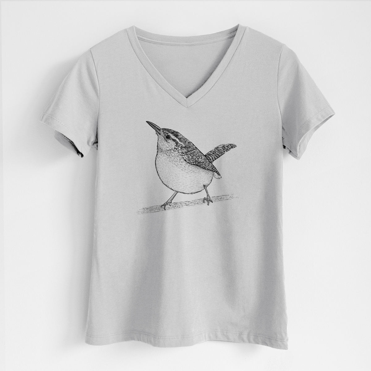 Lunar grey women's relaxed fit cotton V-neck t-shirt laid flat, printed with a detailed black ink sketch of a Carolina wren perched on a branch with its tail raised.