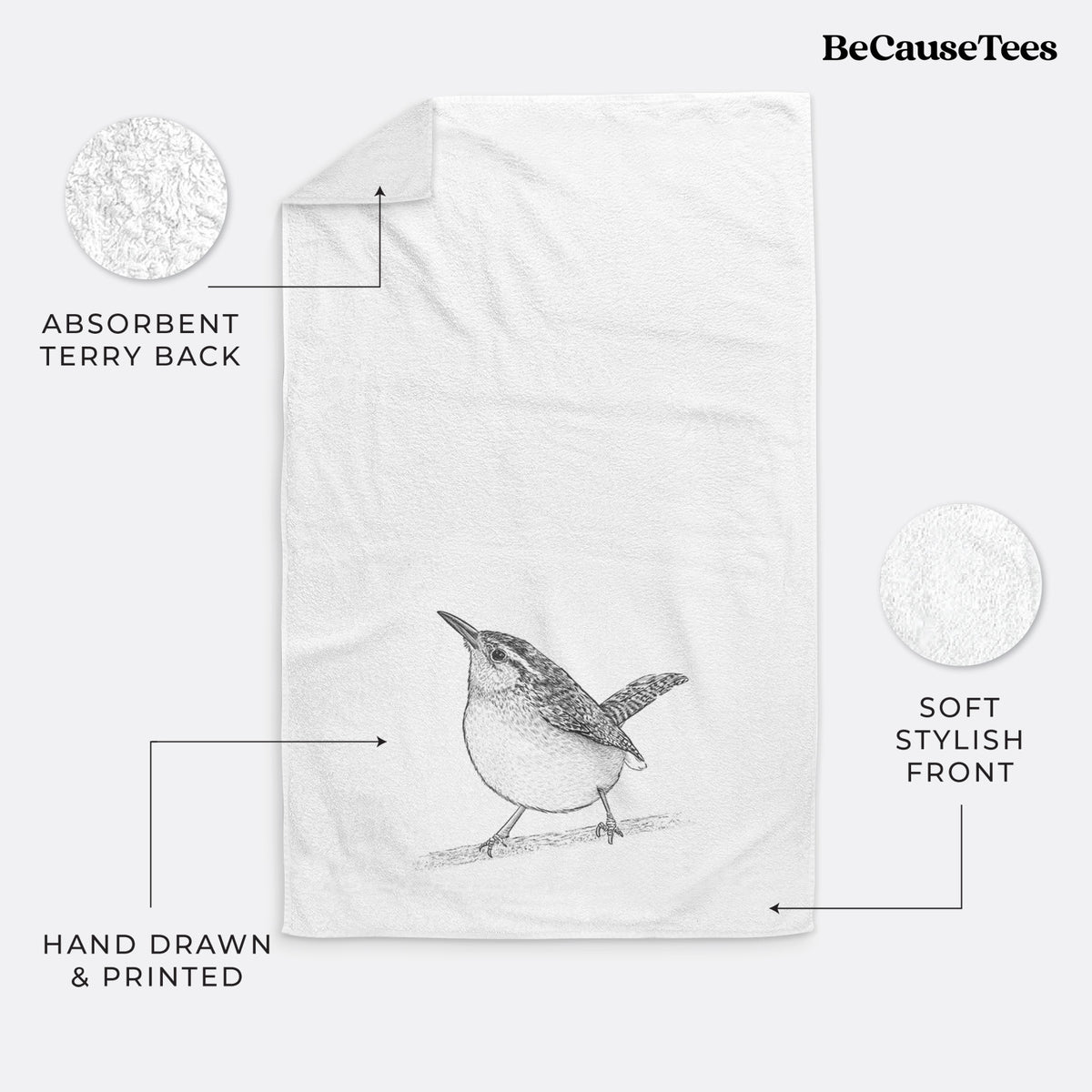 White hand towel printed with a detailed black ink sketch of a Carolina wren perched on a branch with its tail raised.