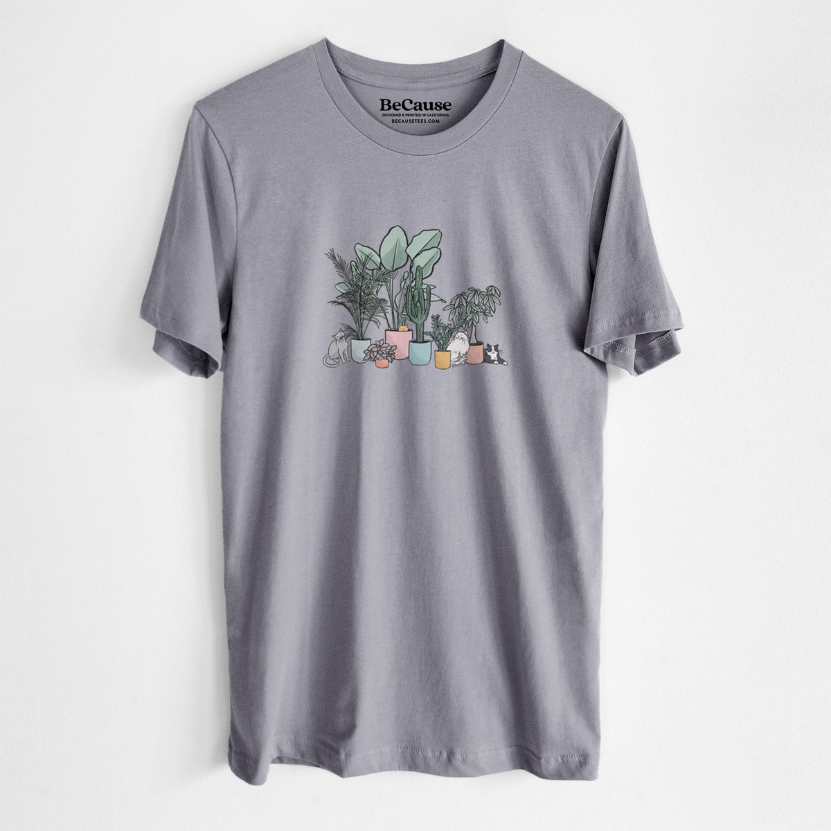 Storm grey lightweight cotton t-shirt laid flat, printed with a full-color illustration of cats lounging among potted houseplants.