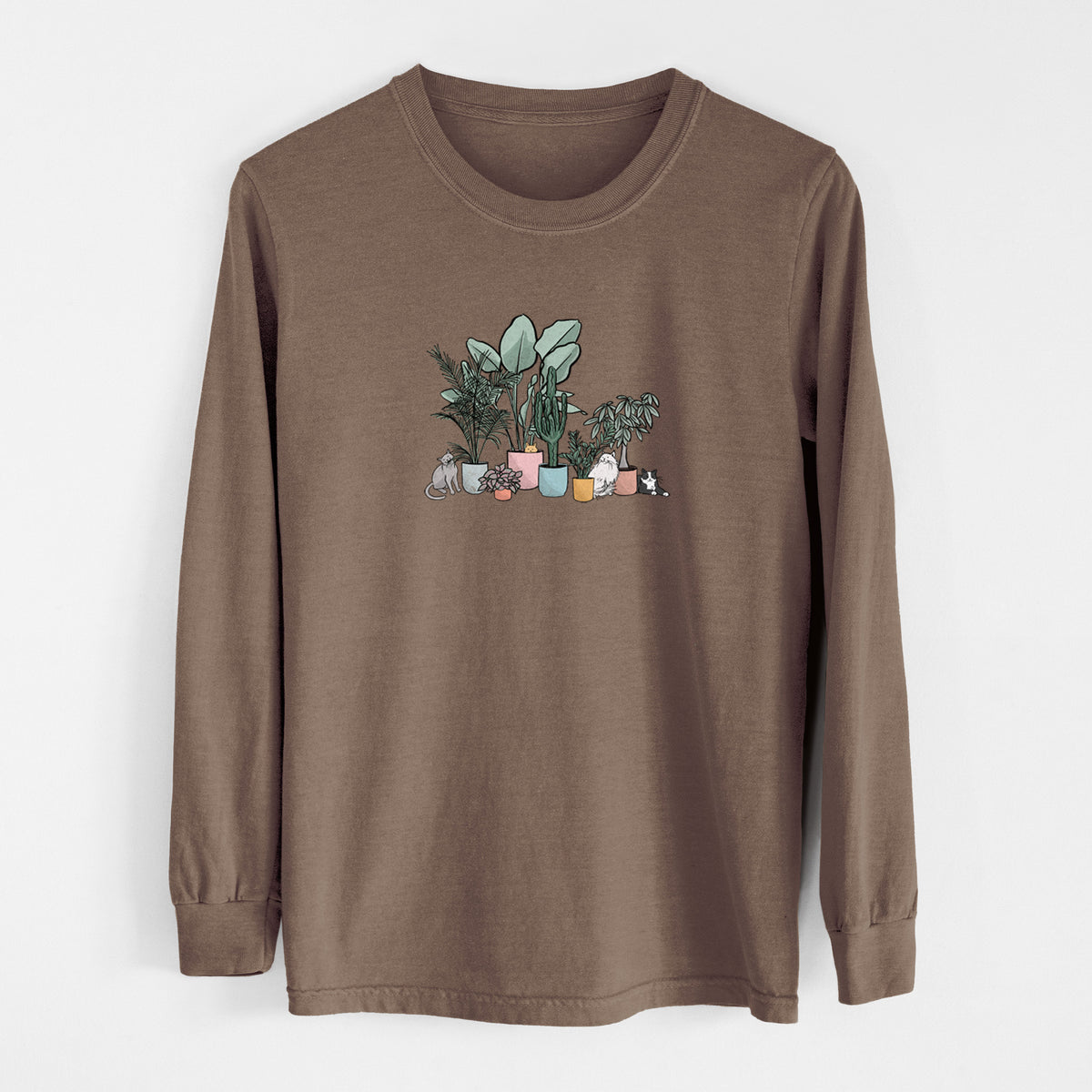 Espresso brown Comfort Colors long sleeve shirt laid flat, printed with a full-color illustration of cats lounging among potted houseplants.