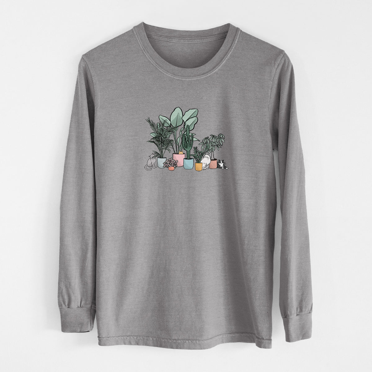 Grey Comfort Colors long sleeve shirt laid flat, printed with a full-color illustration of cats lounging among potted houseplants.