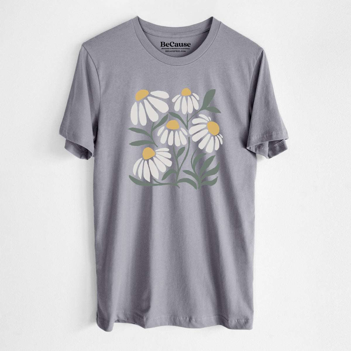Storm grey lightweight cotton t-shirt laid flat, printed with a soft full-color illustration of white chamomile flowers and green leaves.