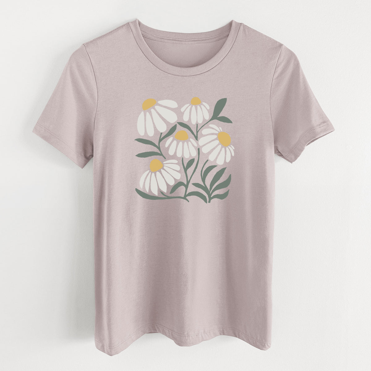 Pink gravel women's relaxed fit cotton t-shirt laid flat, printed with a soft full-color illustration of white chamomile flowers and green leaves.